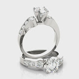 Round Three Stone Engagement Ring (50306-E) — ring spin