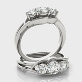 Three-Stone Engagement Ring (Round Center) — ring spin