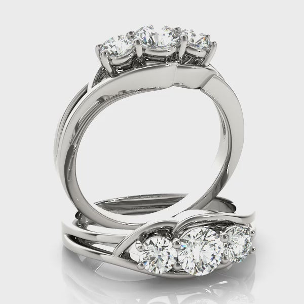 Three-Stone Engagement Ring (Round Center) — ring spin