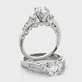 Round Three Stone Engagement Ring (50619-E) — ring spin
