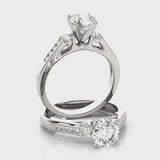Round Three Stone Engagement Ring (50316-E) — ring spin