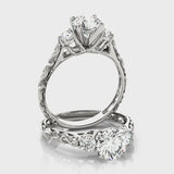 Round Three Stone Engagement Ring (50647-E) — ring spin