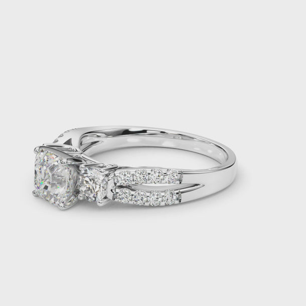 Three-Stone Engagement Ring (Round Center) — ring spin