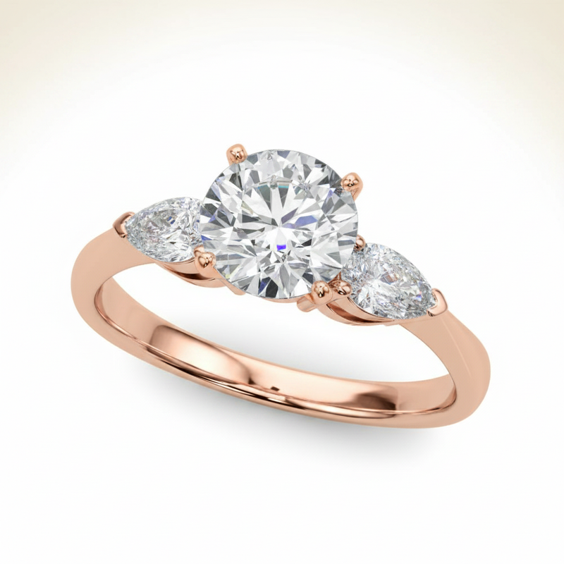 Three-Stone Engagement Ring (Pear Center) — Rose Gold
