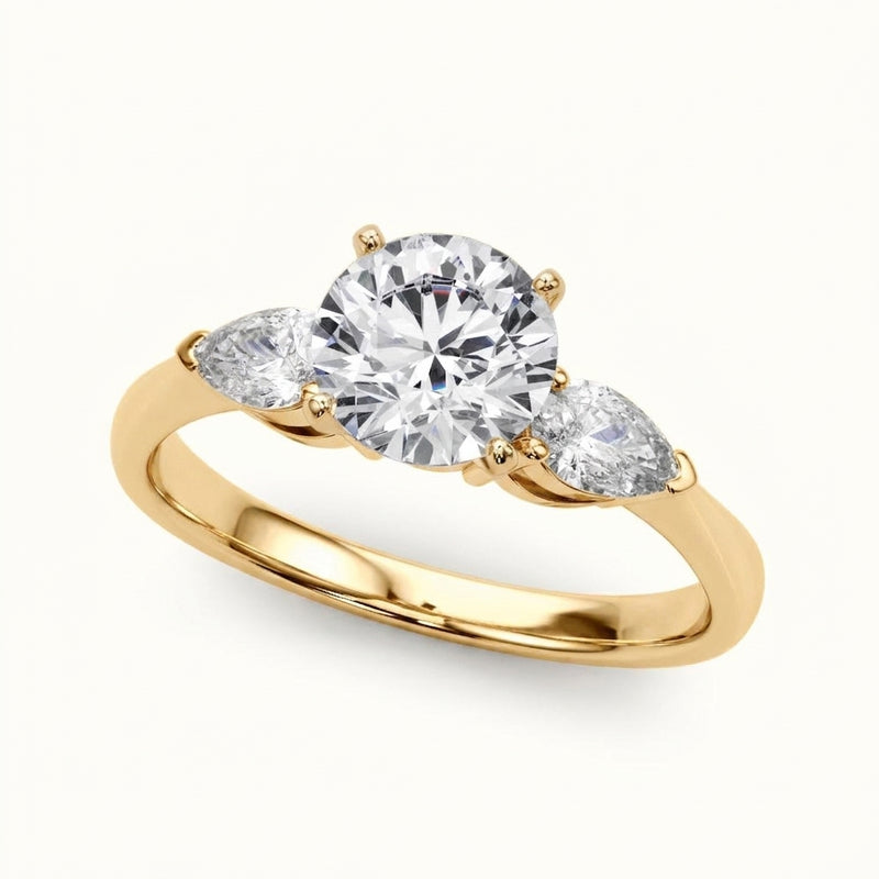 Three-Stone Engagement Ring (Pear Center) — Yellow Gold